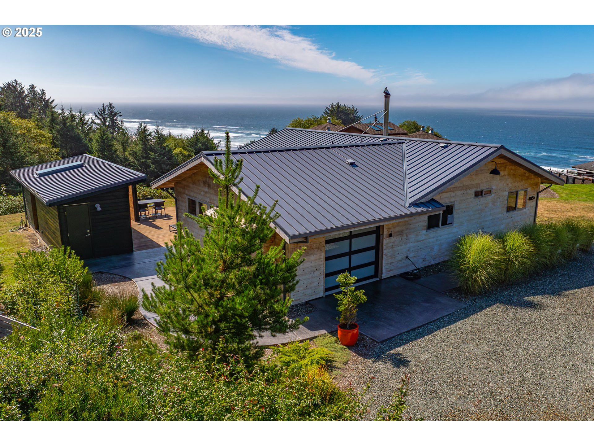 8455 San Dune Road Nehalem, OR 97131 - Photo 5 of 48 a aerial view of a house with a yard