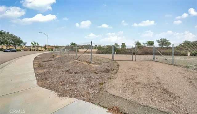 a view of swimming pool with an outdoor seating