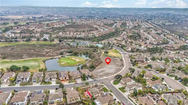 an aerial view of a house with a swimming pool