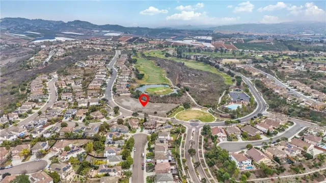 an aerial view of residential house with outdoor space