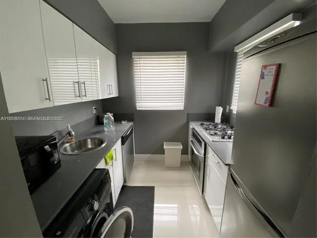 a room with furniture and a window