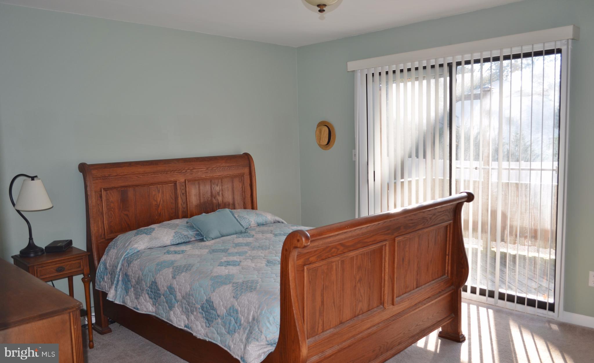 1365 Moyer Road Annapolis, MD 21403 - Photo 11 of 23 a bedroom with a bed and window