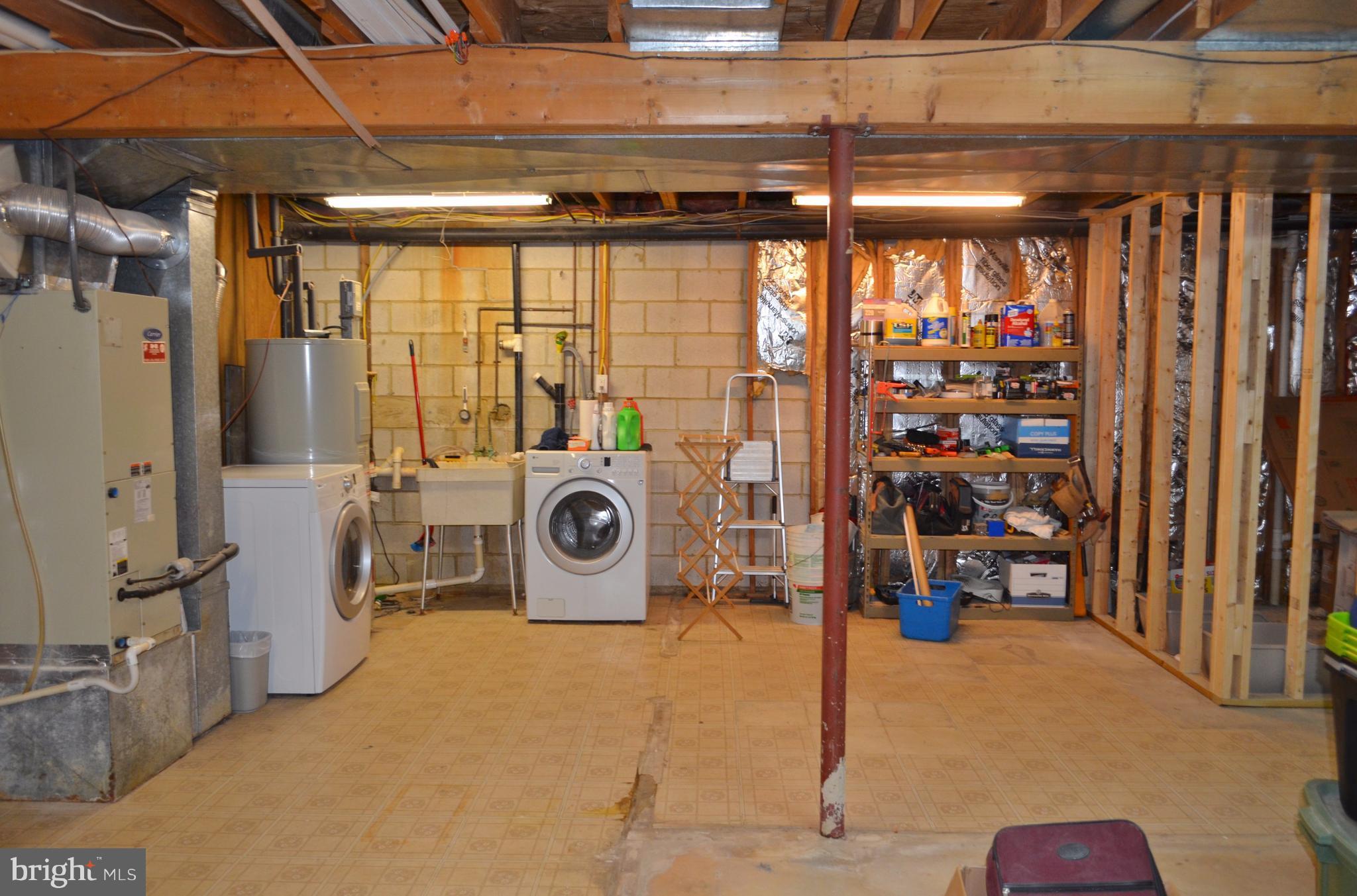 1365 Moyer Road Annapolis, MD 21403 - Photo 18 of 23 a utility room with dryer and washer