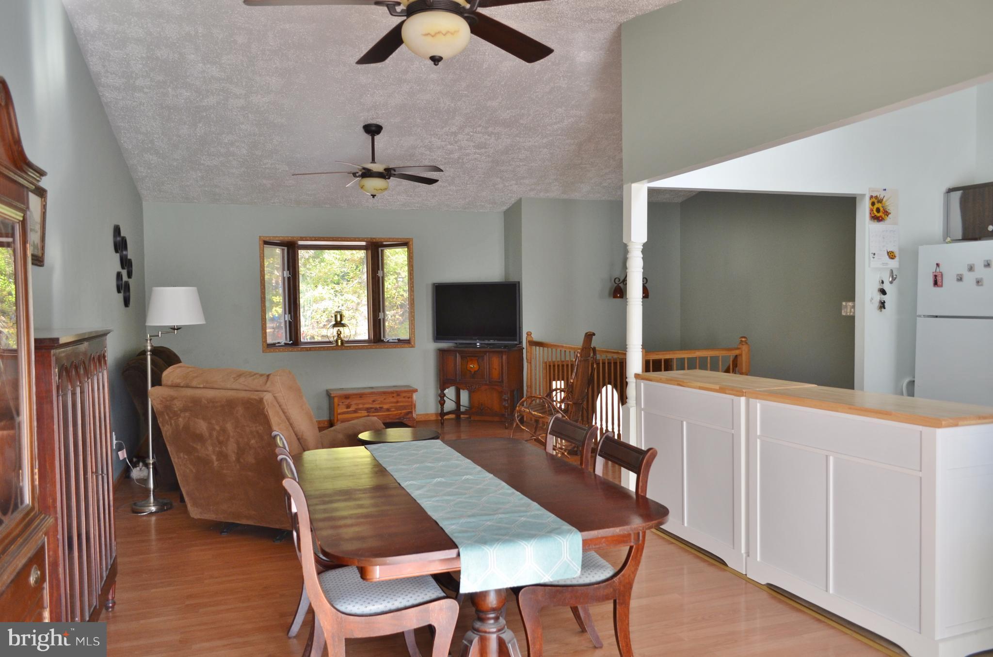 1365 Moyer Road Annapolis, MD 21403 - Photo 3 of 23 a view of a dining room with furniture