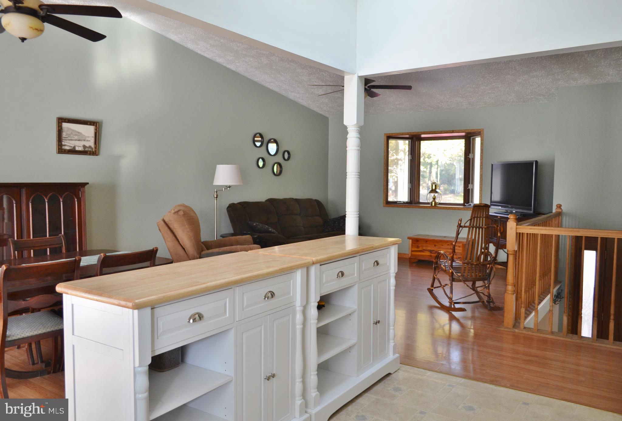 1365 Moyer Road Annapolis, MD 21403 - Photo 5 of 23 a view of living room with furniture and wooden floor