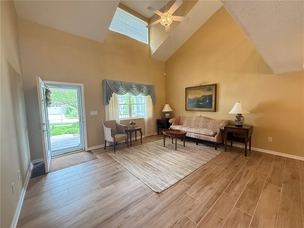 411 Chestnut Lane Apollo, PA 15613 - Photo 3 of 38 a living room with furniture and a wooden floor