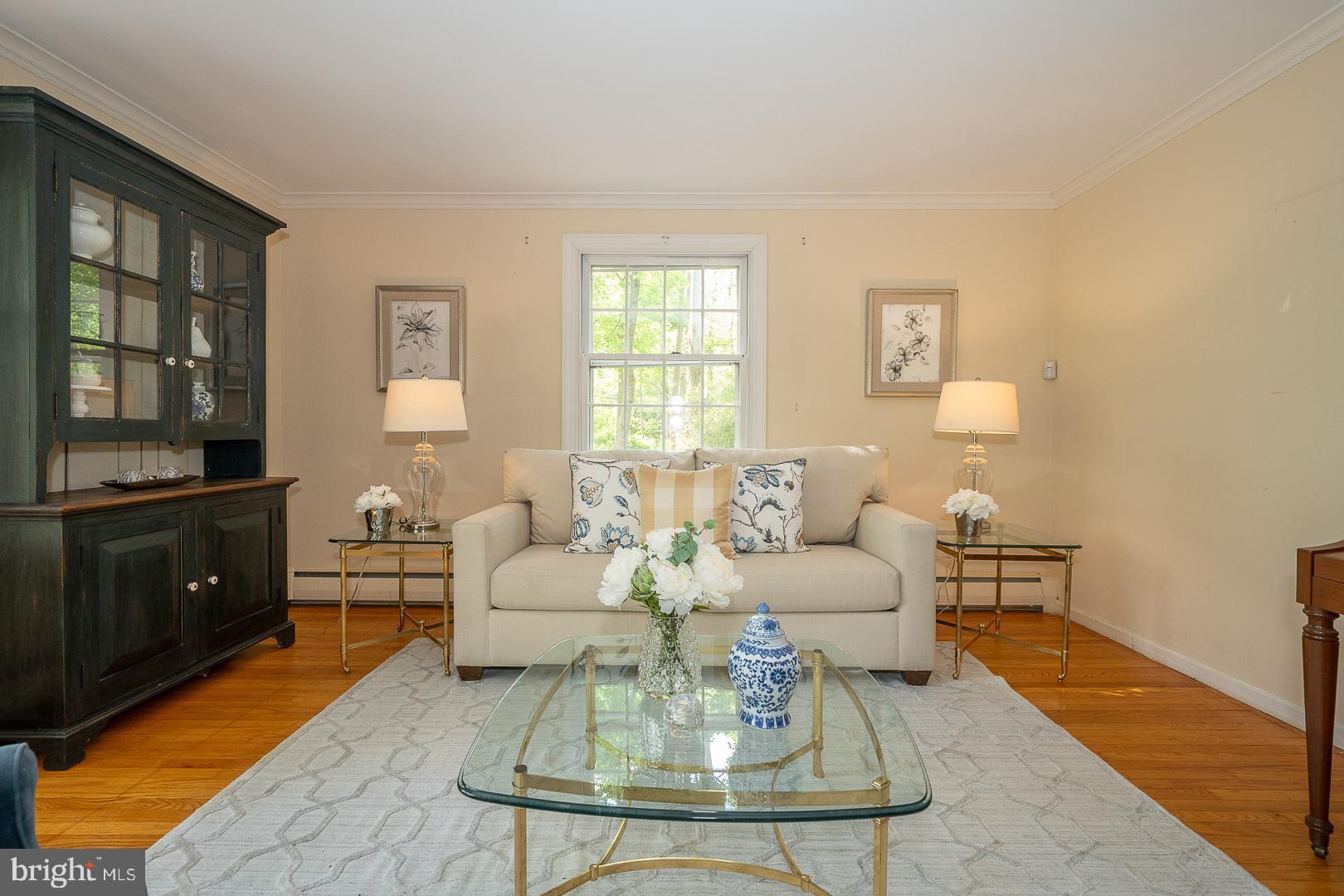 340 Chester Road Devon, PA 19333 - Photo 11 of 48 a living room with furniture a rug and wooden floor