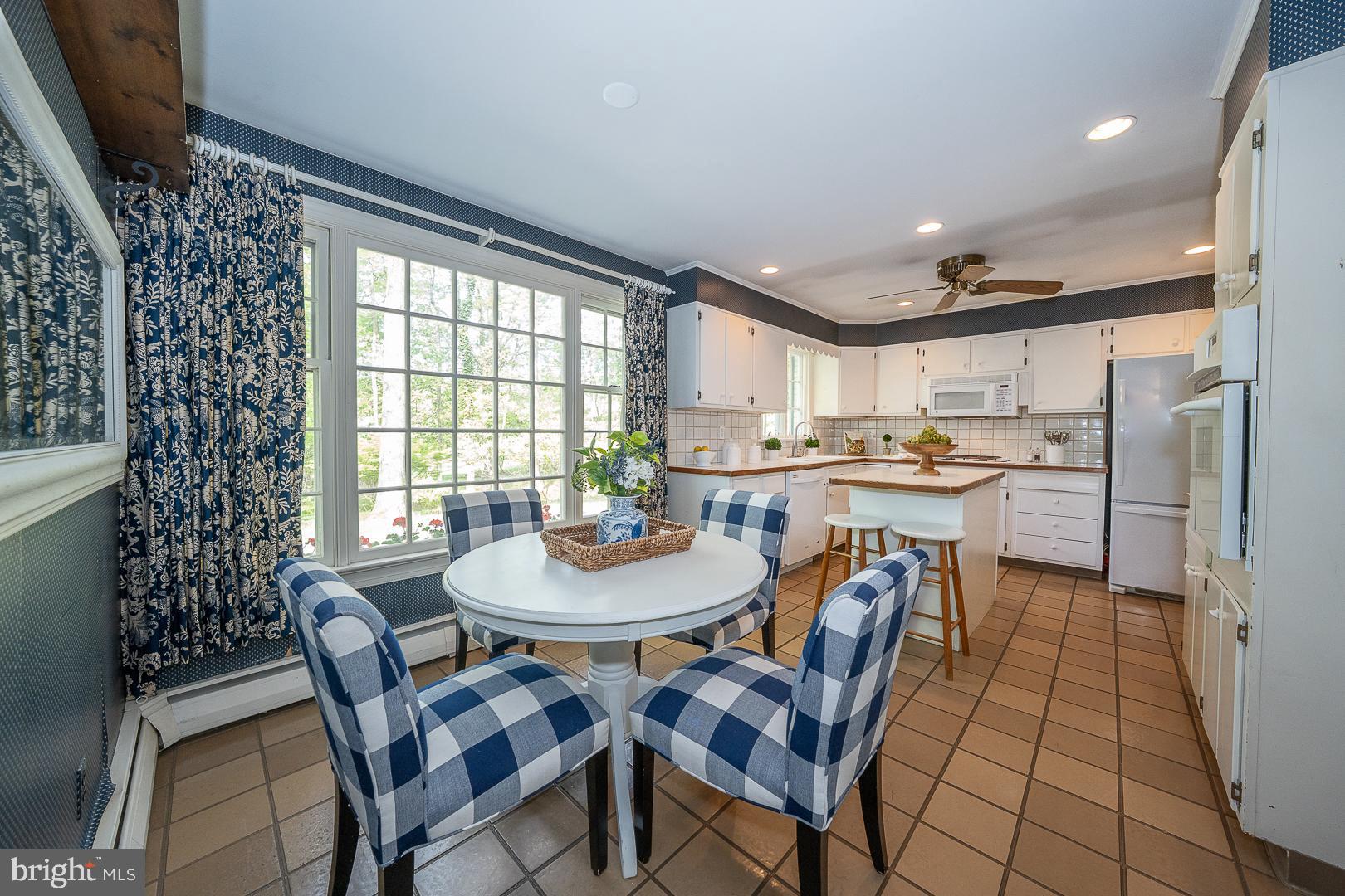 340 Chester Road Devon, PA 19333 - Photo 16 of 48 a view of a dining room with furniture and window