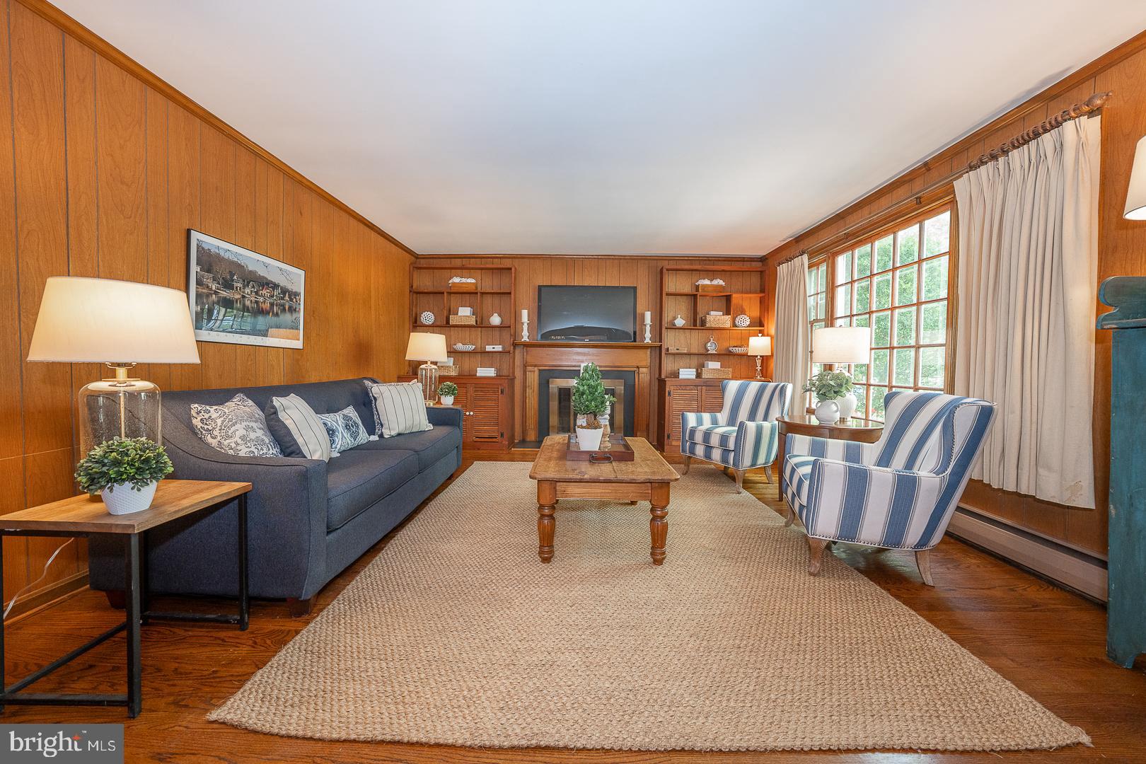 340 Chester Road Devon, PA 19333 - Photo 23 of 48 a living room with furniture and a fireplace