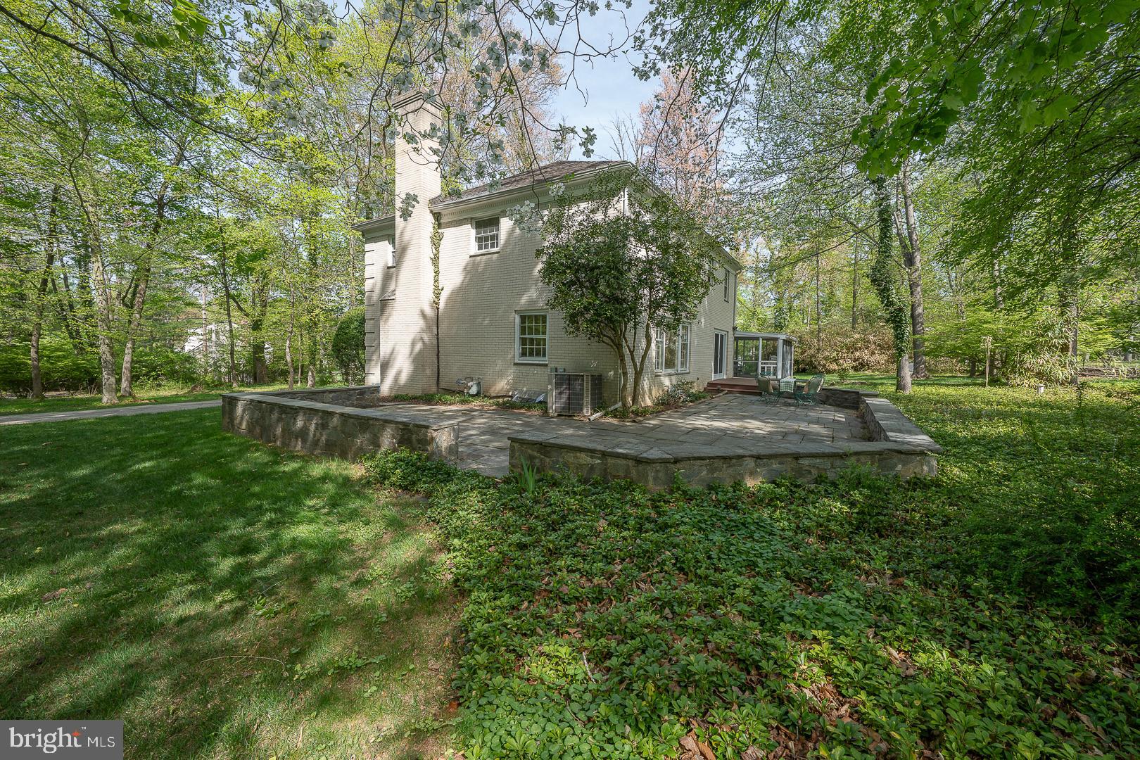 340 Chester Road Devon, PA 19333 - Photo 42 of 48 a view of a fountain in the middle of a yard