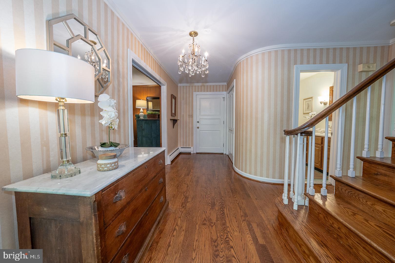 340 Chester Road Devon, PA 19333 - Photo 6 of 48 a bathroom with sinks a vanity and a large mirror