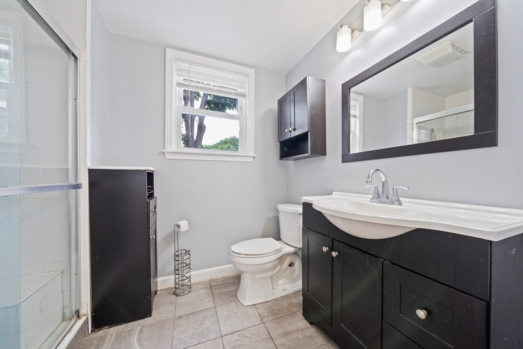 26 Sherman Road Braintree, MA 02184 - Photo 30 of 42 a bathroom with a sink toilet and mirror