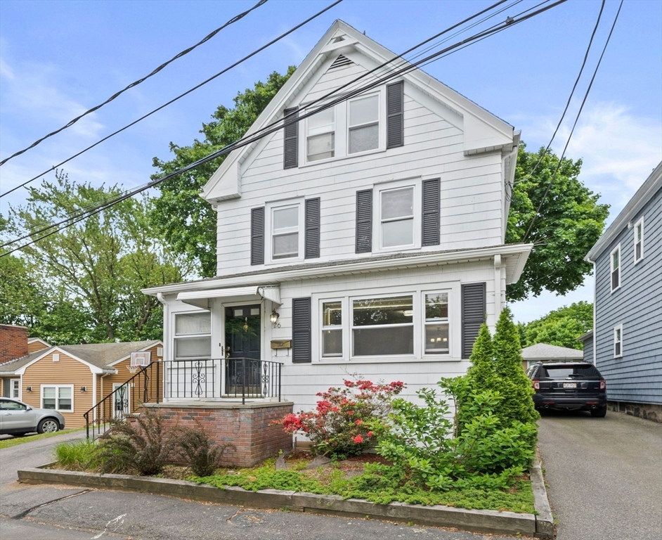 26 Sherman Road Braintree, MA 02184 - Photo 3 of 42 a front view of a house with a yard