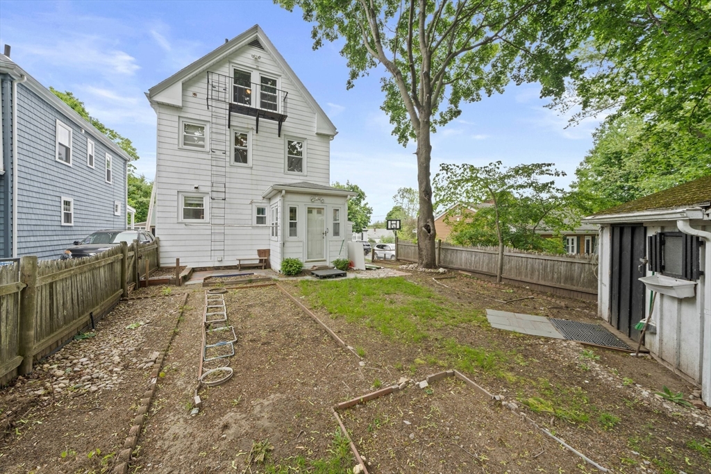 26 Sherman Road Braintree, MA 02184 - Photo 32 of 42 a front view of a house with garden