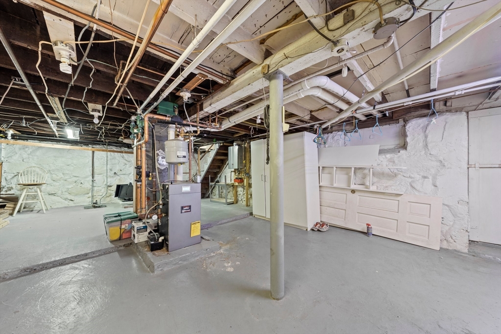 26 Sherman Road Braintree, MA 02184 - Photo 37 of 42 a view of empty room with wooden walls