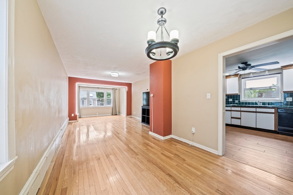 26 Sherman Road Braintree, MA 02184 - Photo 7 of 42 a view of a kitchen with a sink and dishwasher wooden floor