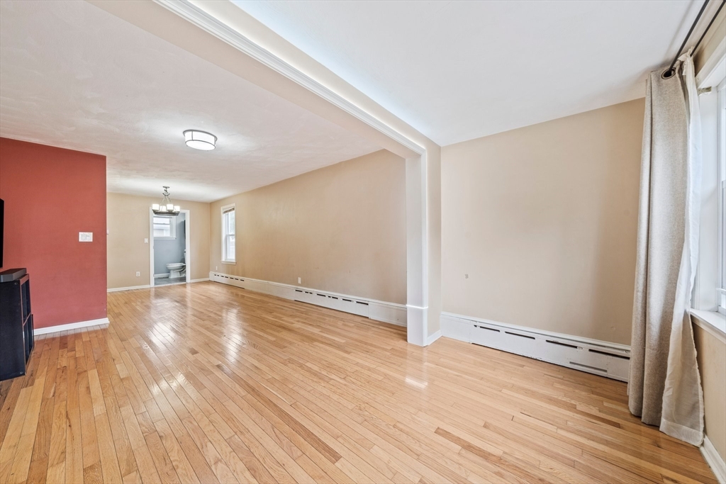 26 Sherman Road Braintree, MA 02184 - Photo 10 of 42 a view of a room with wooden floor