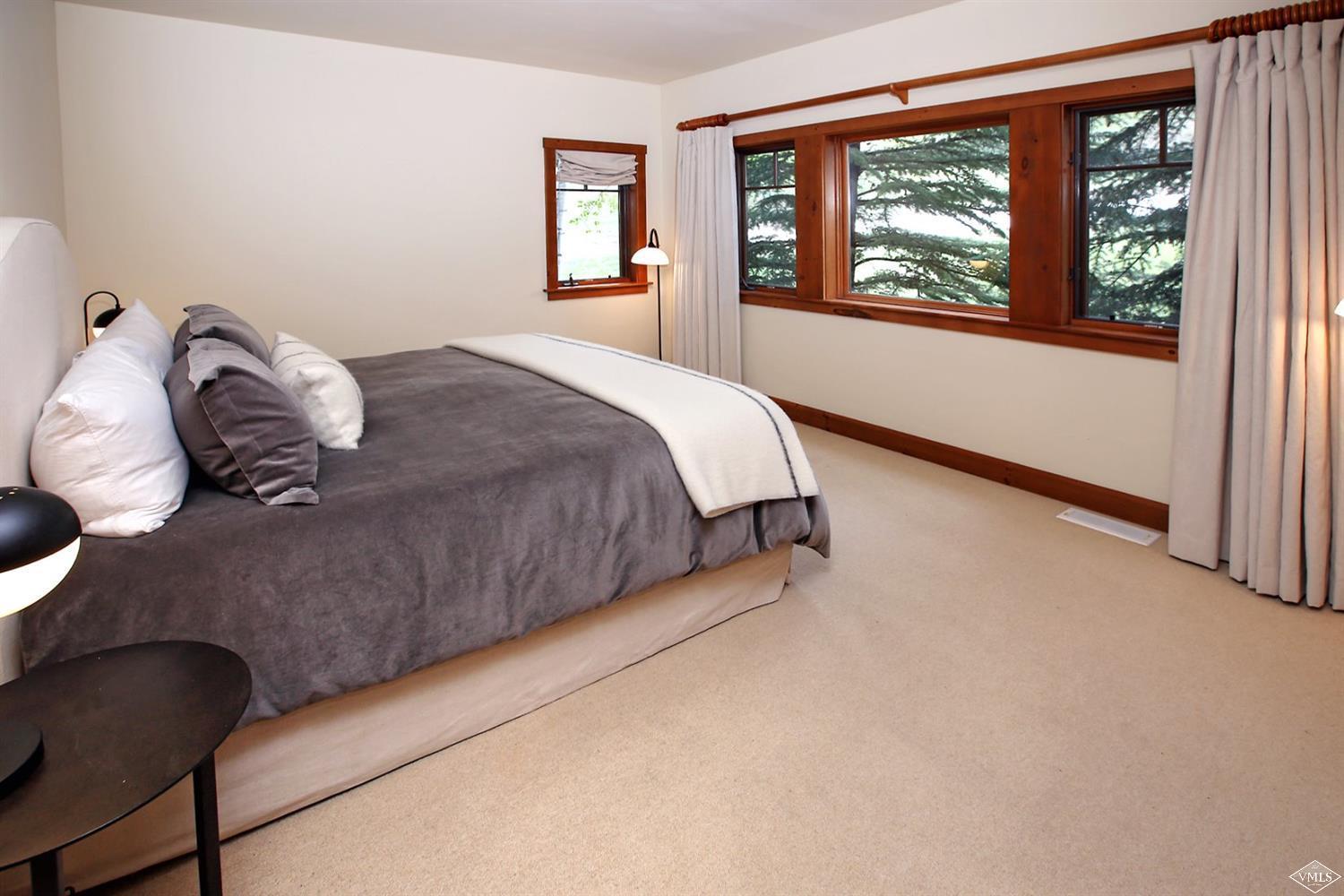404 Cresta Road Edwards, CO 81632 - Photo 15 of 25 a bedroom with a bed and window