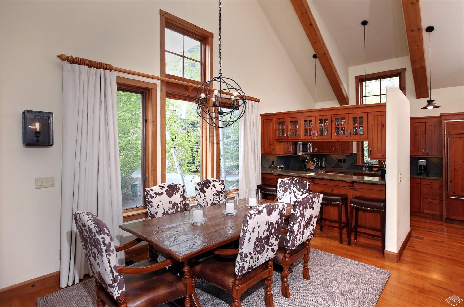 404 Cresta Road Edwards, CO 81632 - Photo 9 of 25 a view of a dining room with furniture window and outside view