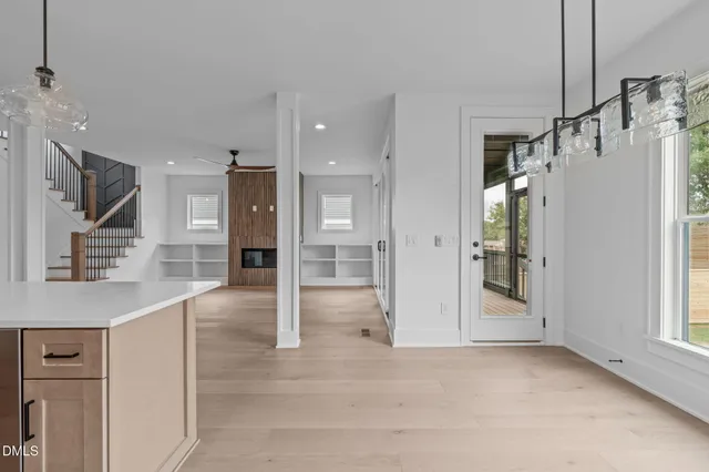 a view of a balcony with wooden floor