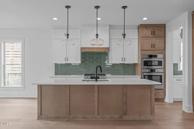 a view of livingroom with furniture wooden floor and window