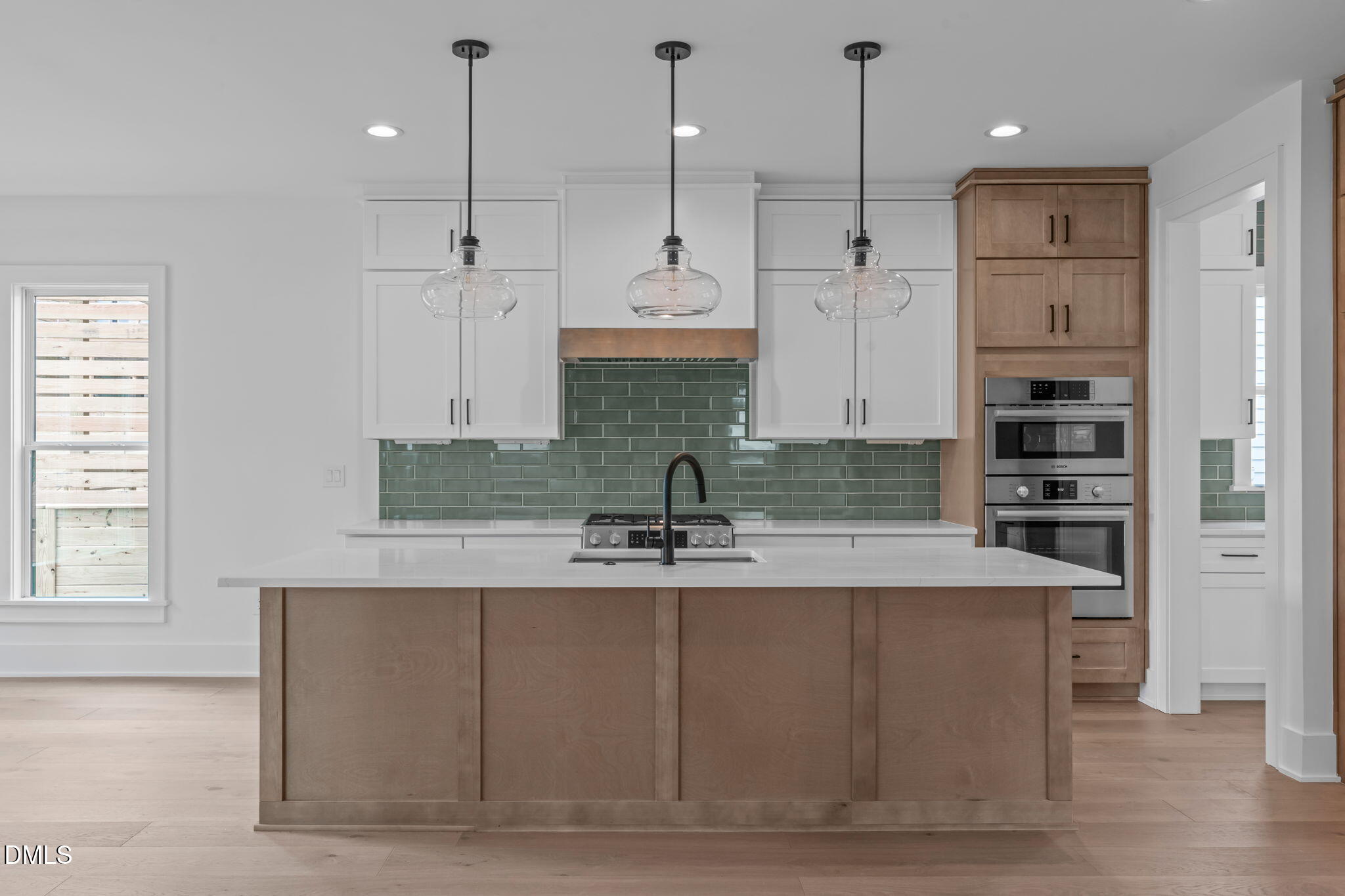 1012 Addison Place Raleigh, NC 27610 - Photo 19 of 56 a large kitchen with stainless steel appliances granite countertop a sink a oven a refrigerator and a granite counter tops