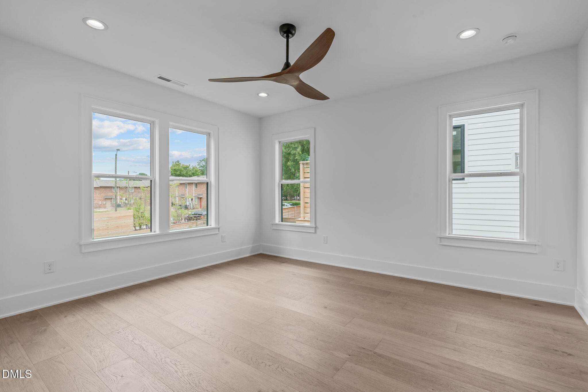 1012 Addison Place Raleigh, NC 27610 - Photo 24 of 56 a view of an empty room with a window
