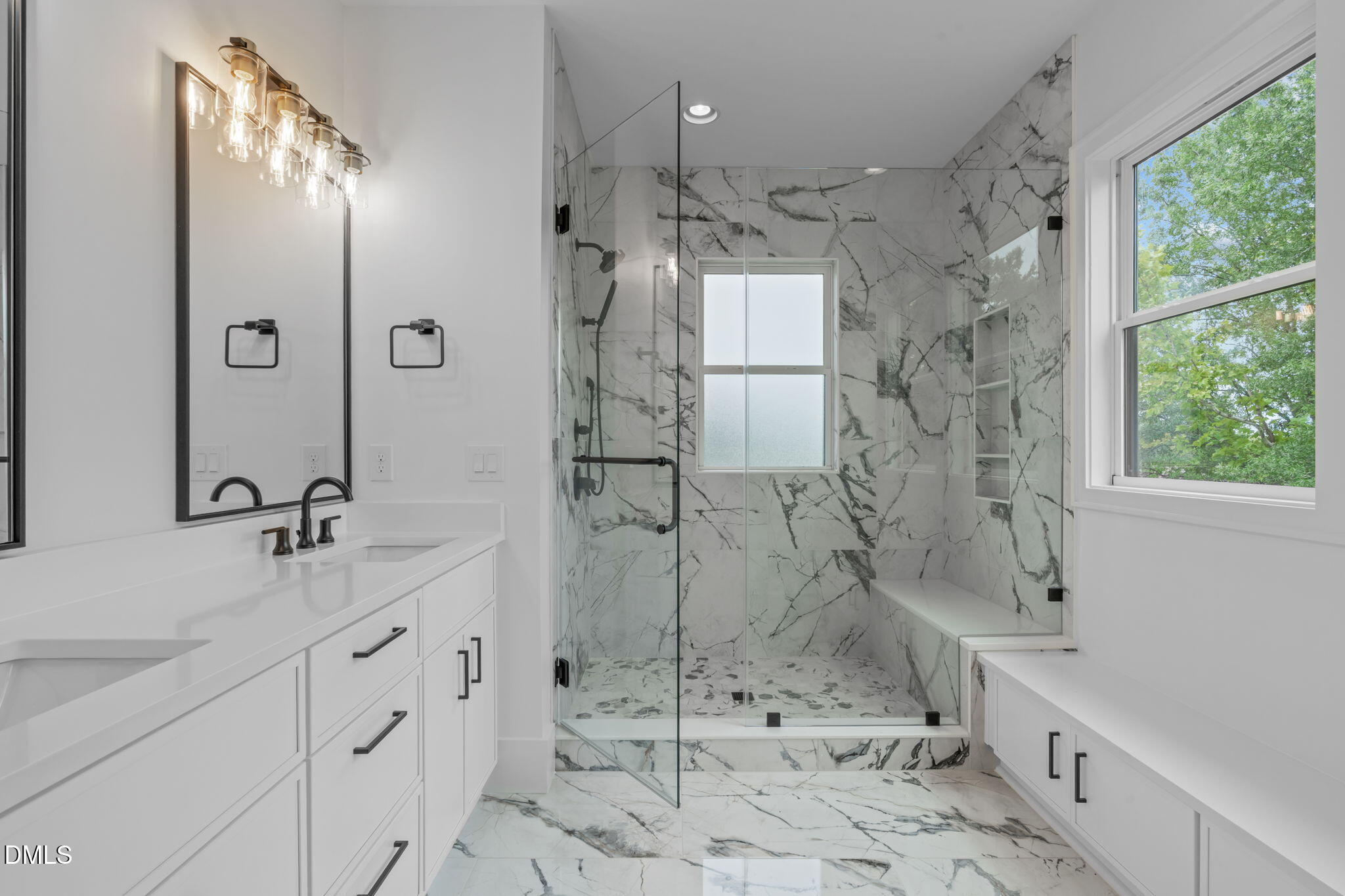 1012 Addison Place Raleigh, NC 27610 - Photo 25 of 56 a bathroom with a sink shower and a mirror