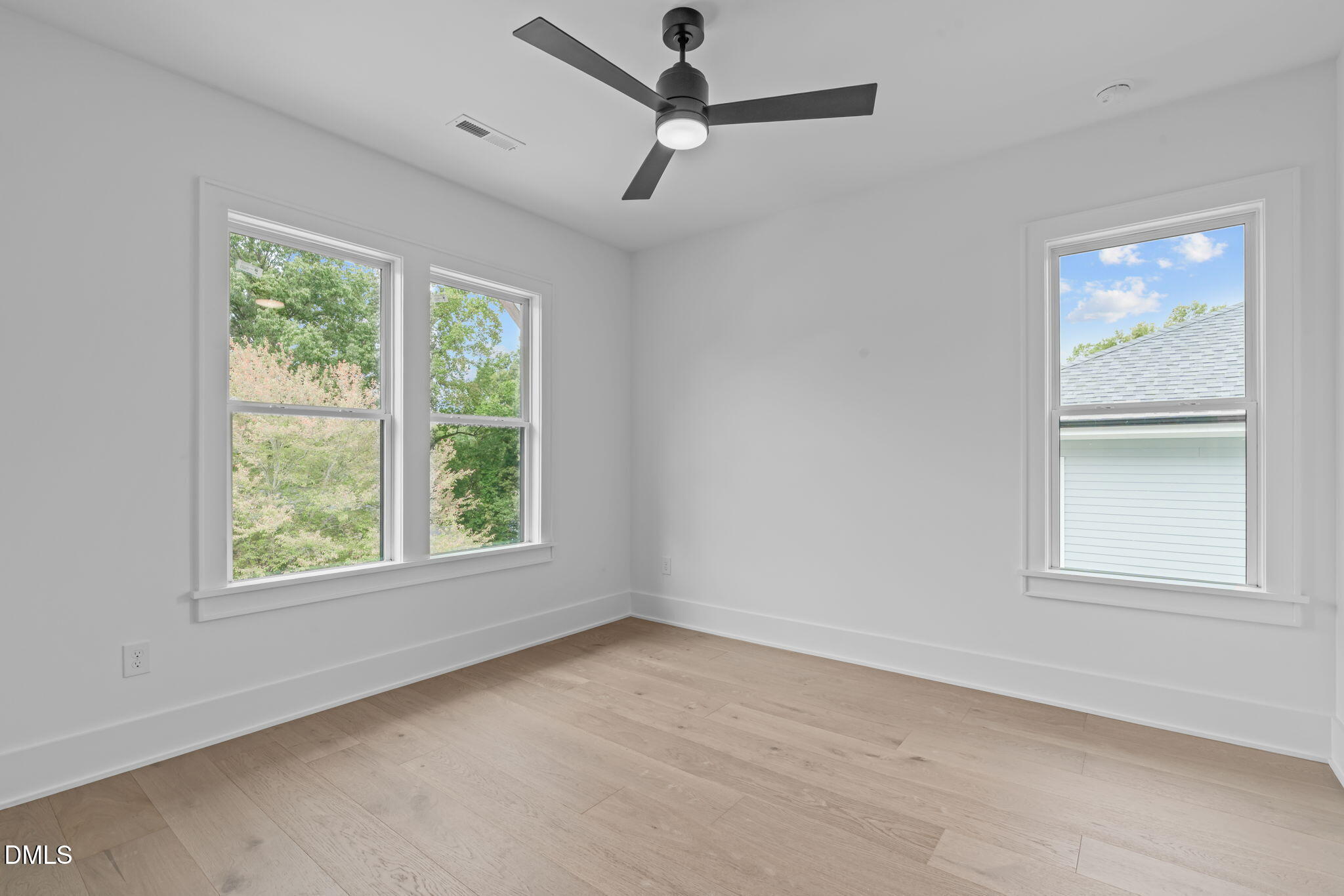 1012 Addison Place Raleigh, NC 27610 - Photo 35 of 56 a view of an empty room with a window