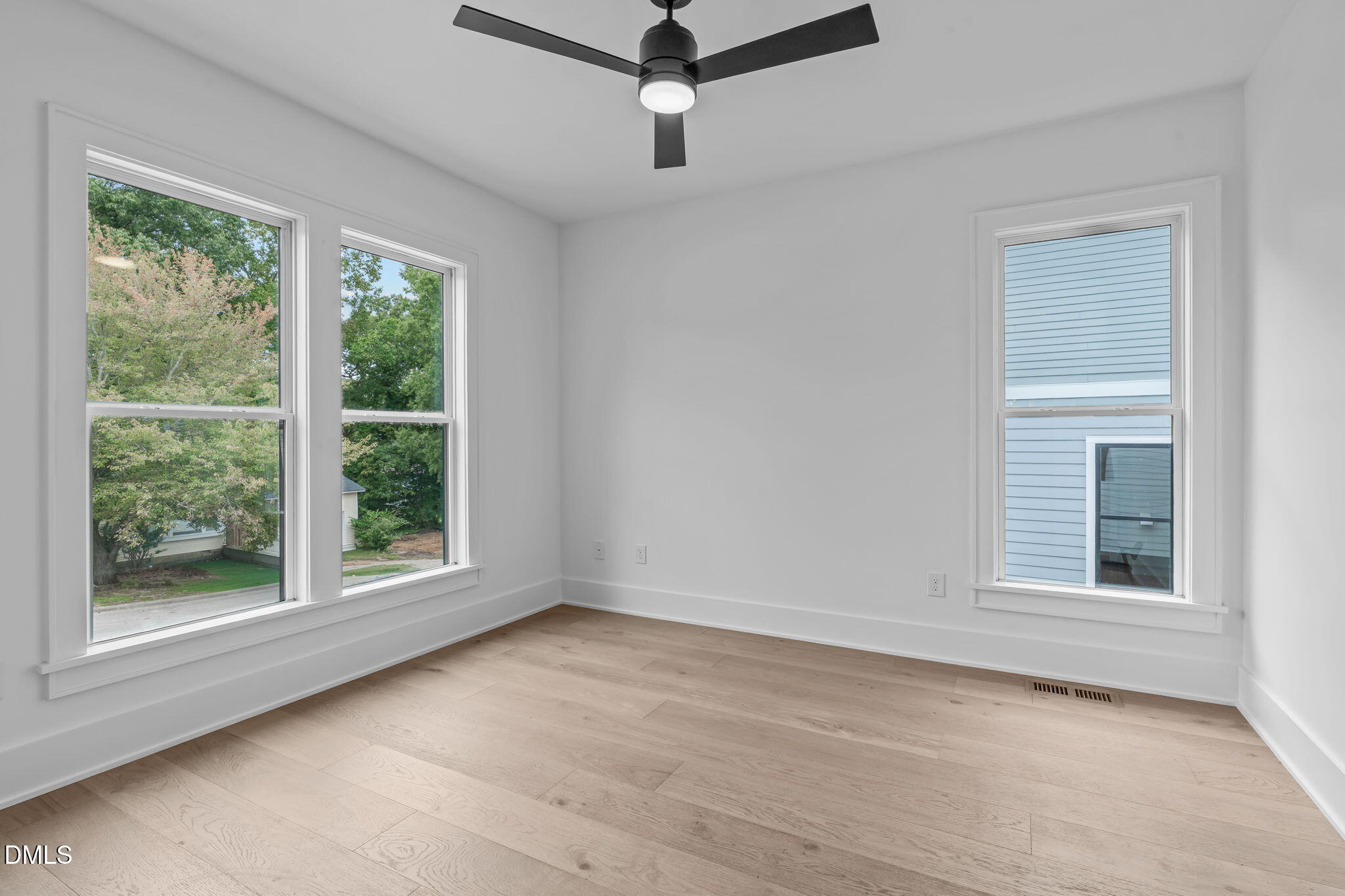 1012 Addison Place Raleigh, NC 27610 - Photo 3 of 56 a view of an empty room with a window