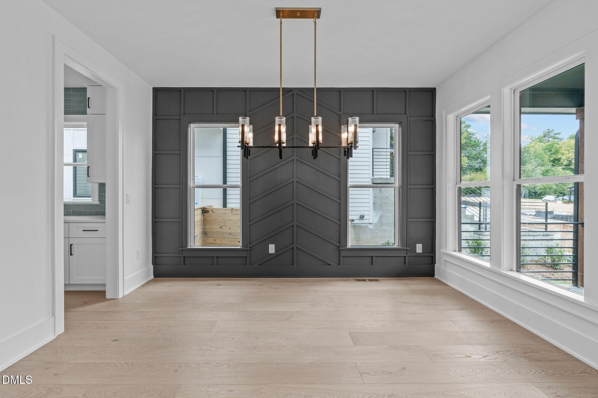 1012 Addison Place Raleigh, NC 27610 - Photo 5 of 56 a view of a kitchen with a sink and a large window