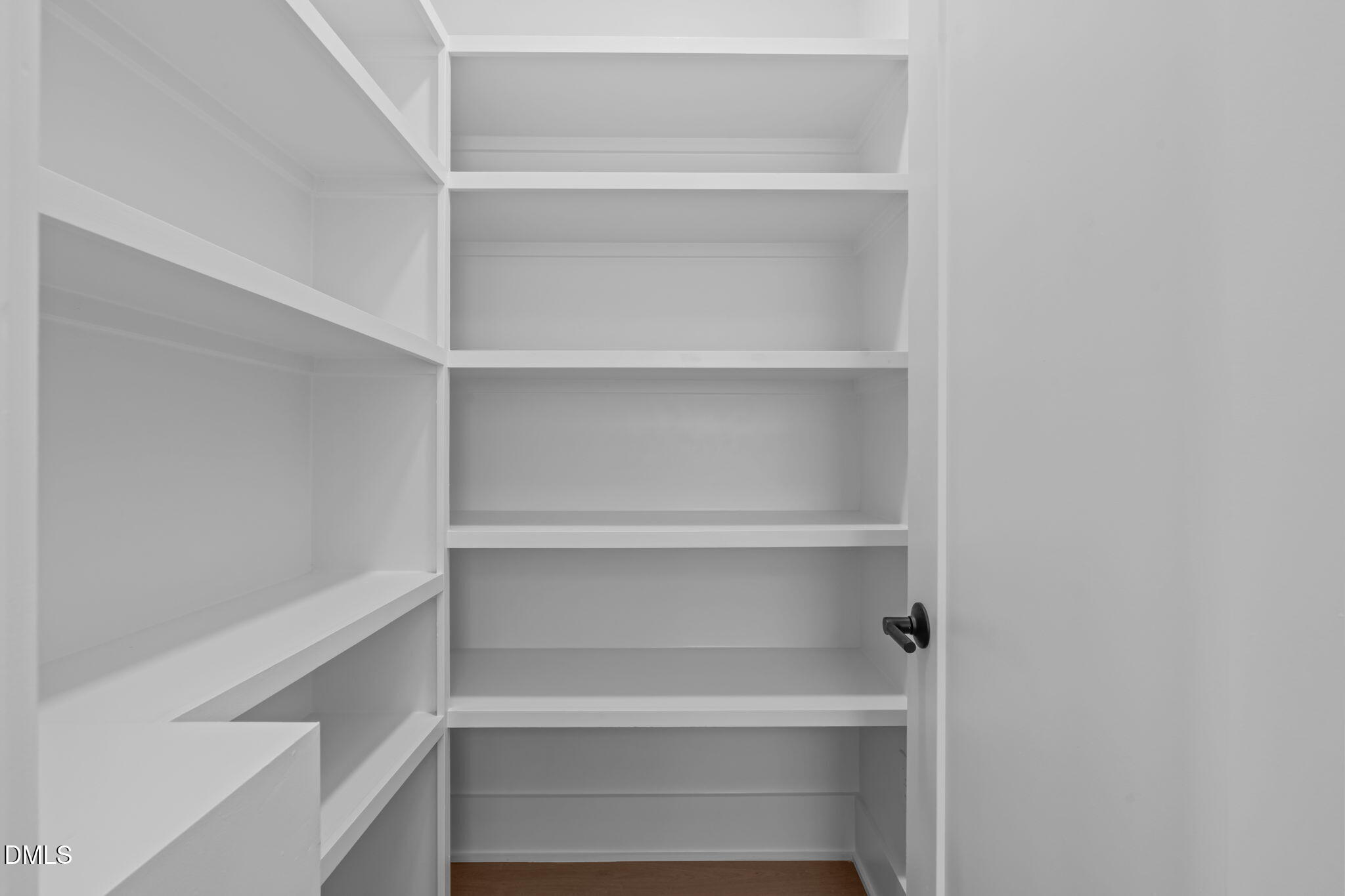 1012 Addison Place Raleigh, NC 27610 - Photo 8 of 56 a view of an empty walk in closet