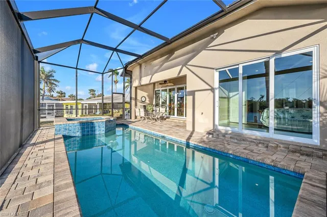 a view of a balcony with dining area
