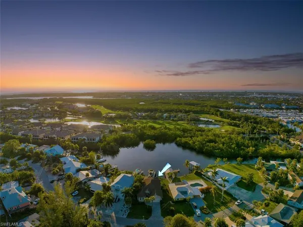 a view of a lake with a city
