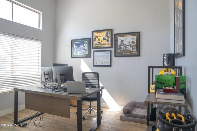 a workspace with furniture and a window
