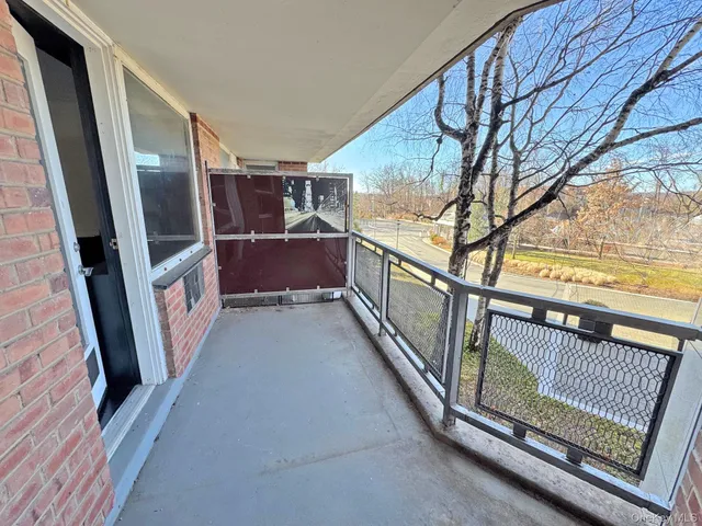 a room with pool table and a chandelier