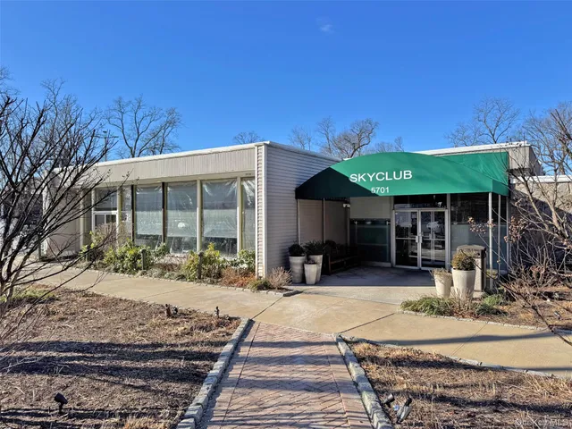 a view of a building with a bench