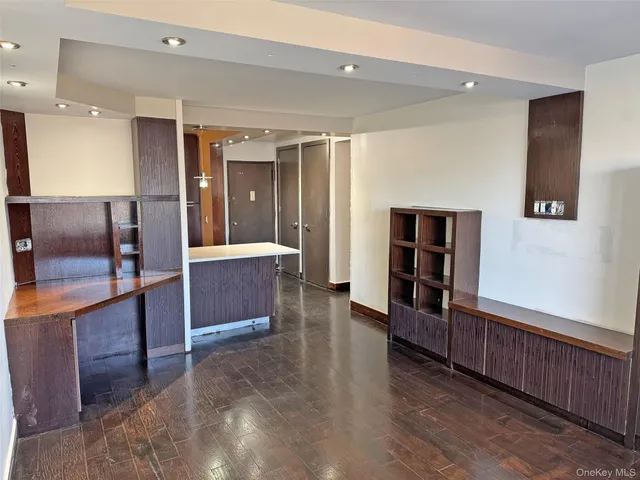 a view of gallery with wooden floor