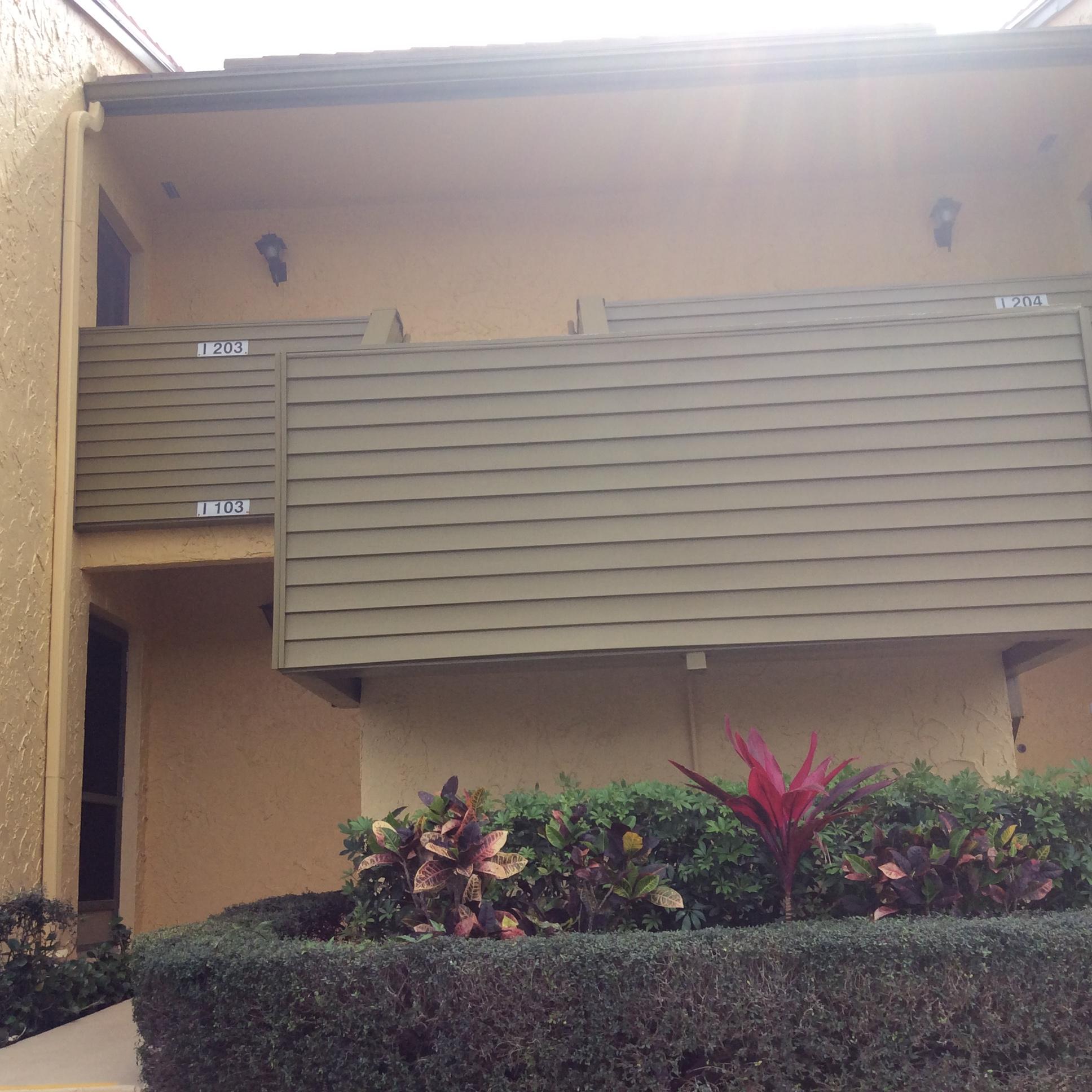 5333 Southeast Miles Grant Road, Unit I203 Stuart, FL 34997 - Photo 1 of 13 FRONT ENTRANCE
