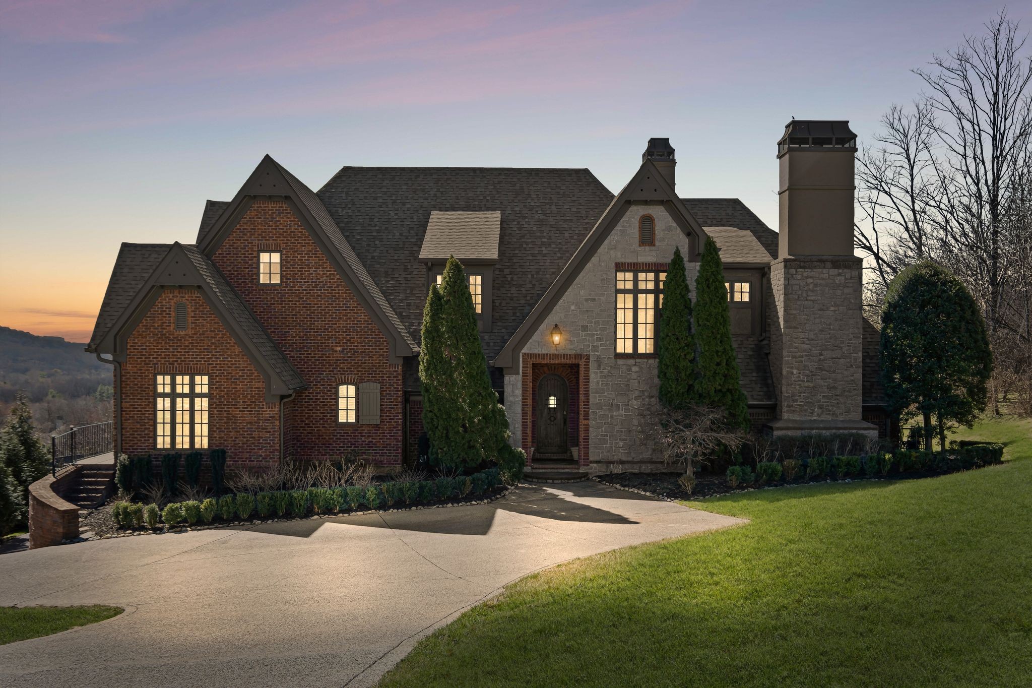 513 Legends Ridge Court Franklin, TN 37069 - Photo 3 of 89 a front view of a house with a yard