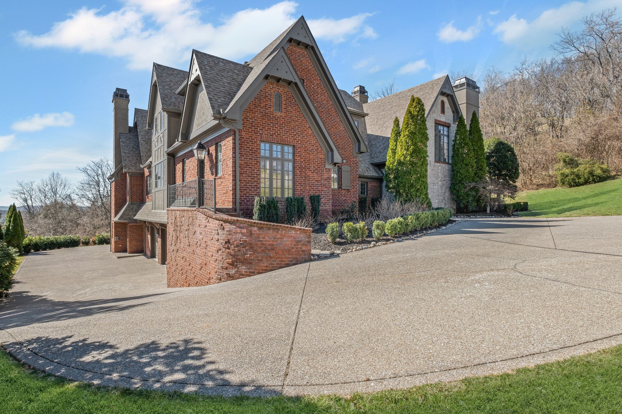 513 Legends Ridge Court Franklin, TN 37069 - Photo 4 of 89 a front view of multiple houses with yard