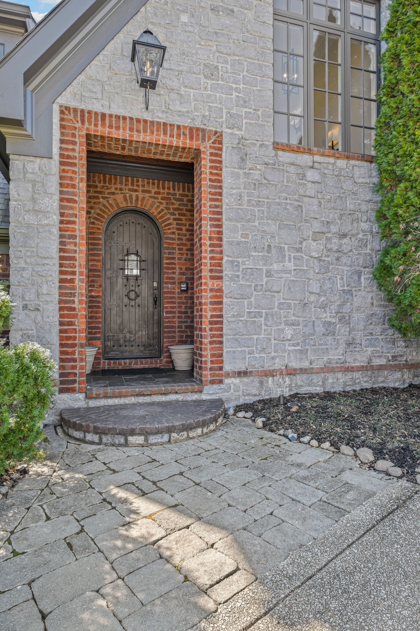 513 Legends Ridge Court Franklin, TN 37069 - Photo 5 of 89 a front view of a house with a garden