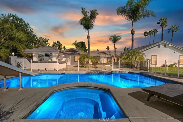 an aerial view of a house with a big yard