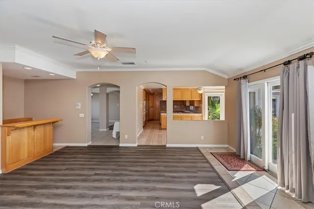 a view of a kitchen with a sink and a window