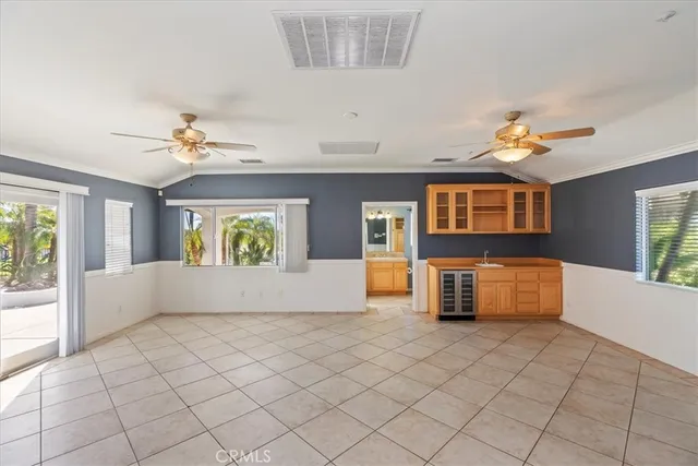 a kitchen that has a sink and a stove in it