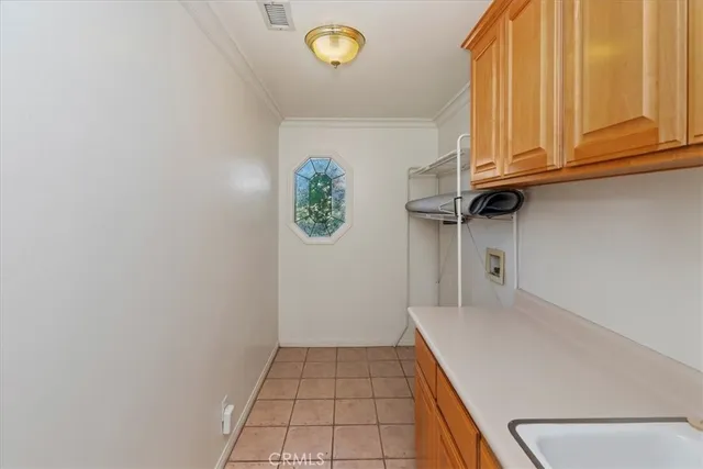 a spacious bathroom with a granite countertop sink mirror and double