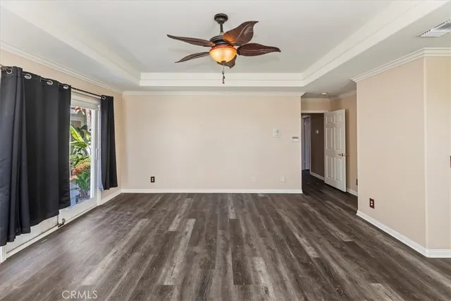 a view of a swimming pool with a table and chairs
