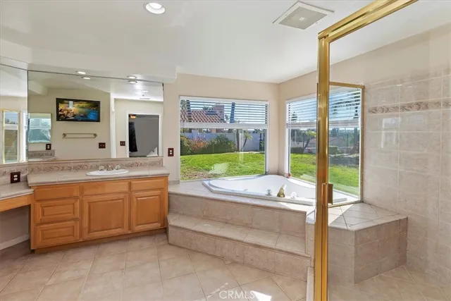 a view of a swimming pool with a lounge chairs