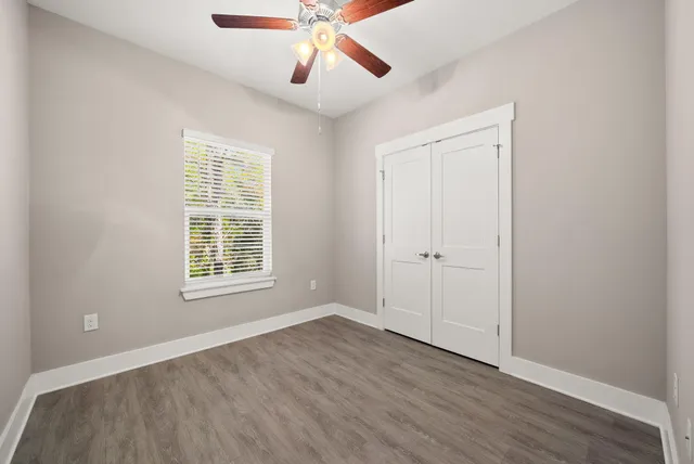 a spacious bathroom with a large tub and sink