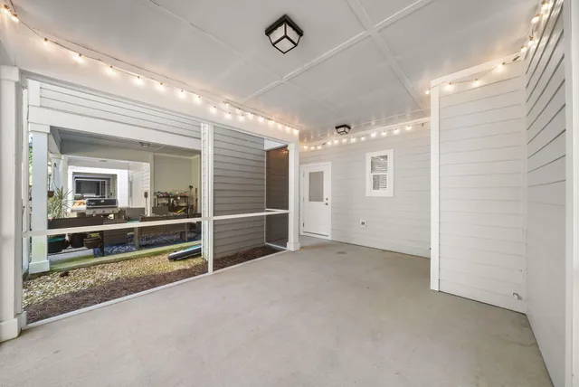 a view of a swimming pool with an outdoor seating area